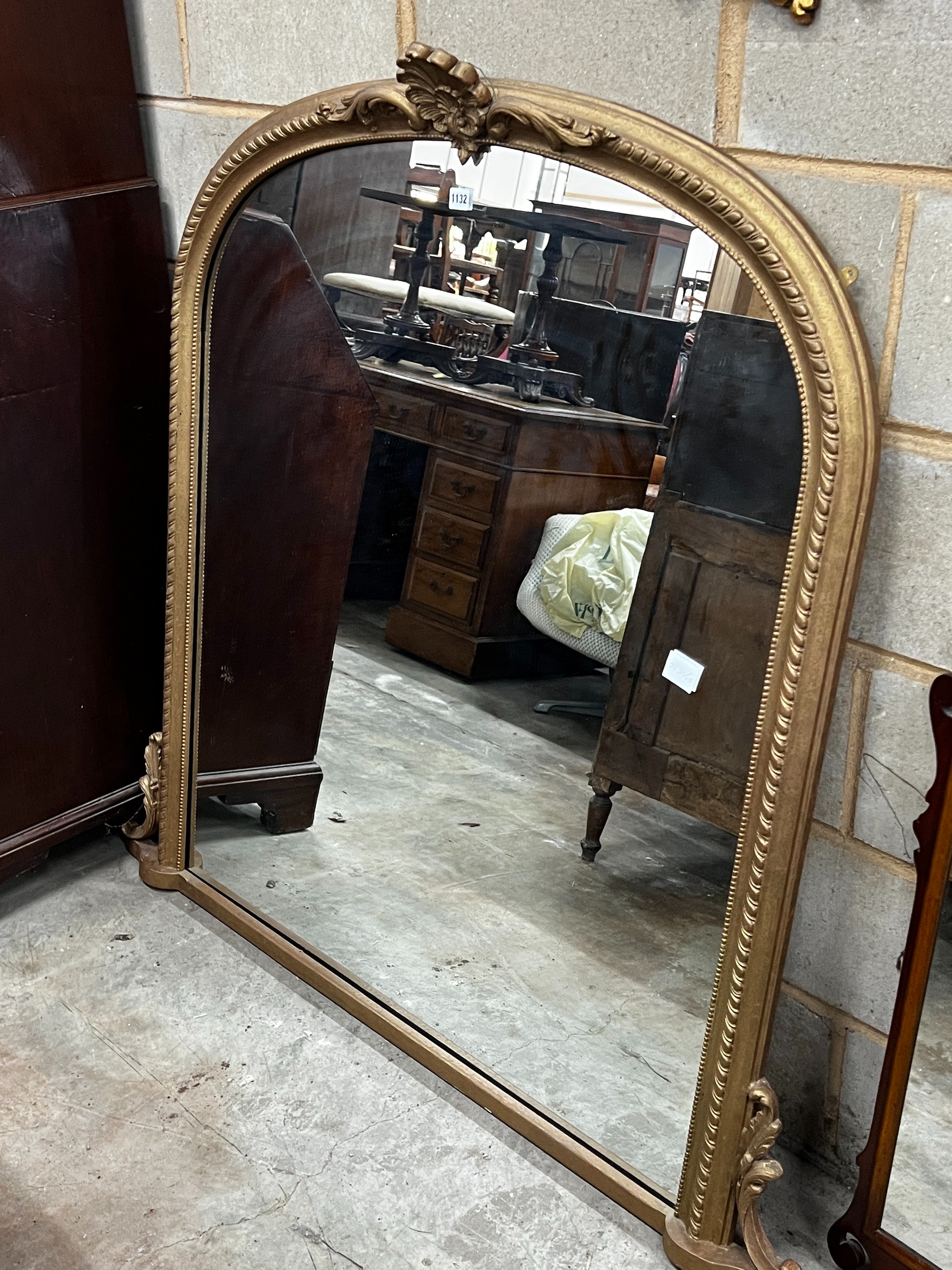 A Victorian style gilt framed overmantel mirror, height 124cm